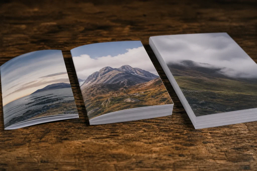 Business brochures showing different paper weights side by side.