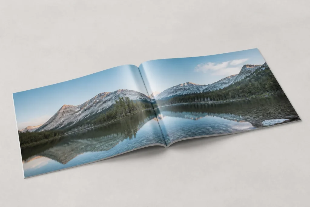 Open booklet cover spread showing clear space around the fold and outer edges for booklet printing artwork bleed guide.